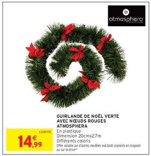 Guirlande de Noël verte avec nœuds rouges